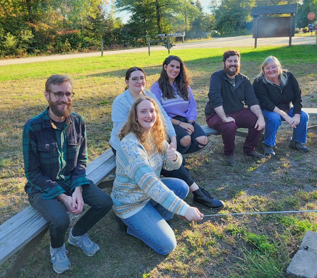 The Night Kitchen team sitting outside