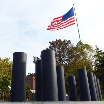 Pillars by an American flag
