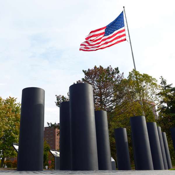 Pillars by an American flag